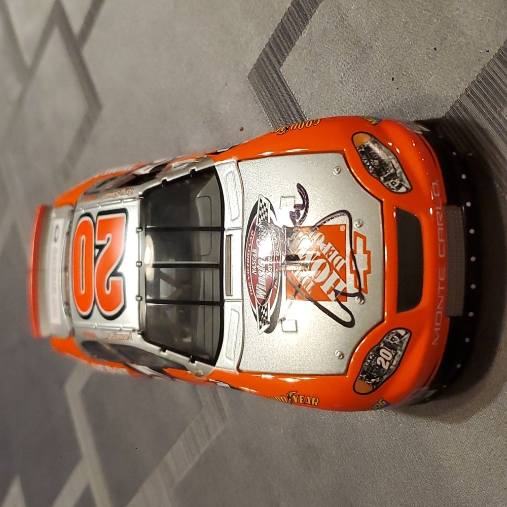 1:24 die cast, 2002 Winston Cup Champ Tony Stewart car, autographed by Joe Gibbs